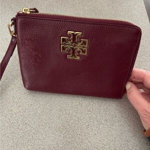 Tory Burch Maroon Leather Wristlet with Gold Emblem